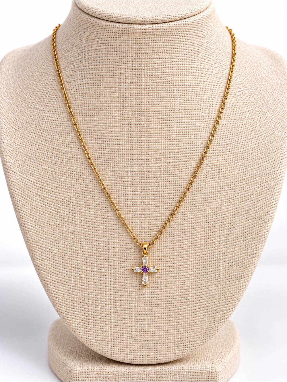 Gold tone chain on stainless with purple accent cross pendant necklace